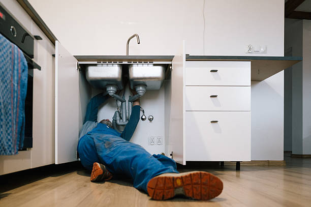 Professional Drain Cleaning technician working in Perryville, AR